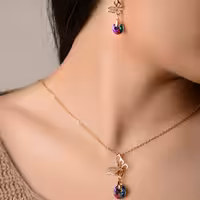 نیم ست پروانه سواروفسکی با نگین های ظریف به همراه زنجیر 