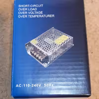 آداپتور(ترانس)12ولت5آمپر برندنوراک بدنه فلزی