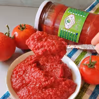 رب گوجه فرنگی خانگی هیوا کوک کنسرو شده غلیظ و کم نمک با رنگ وطعم طبیعی