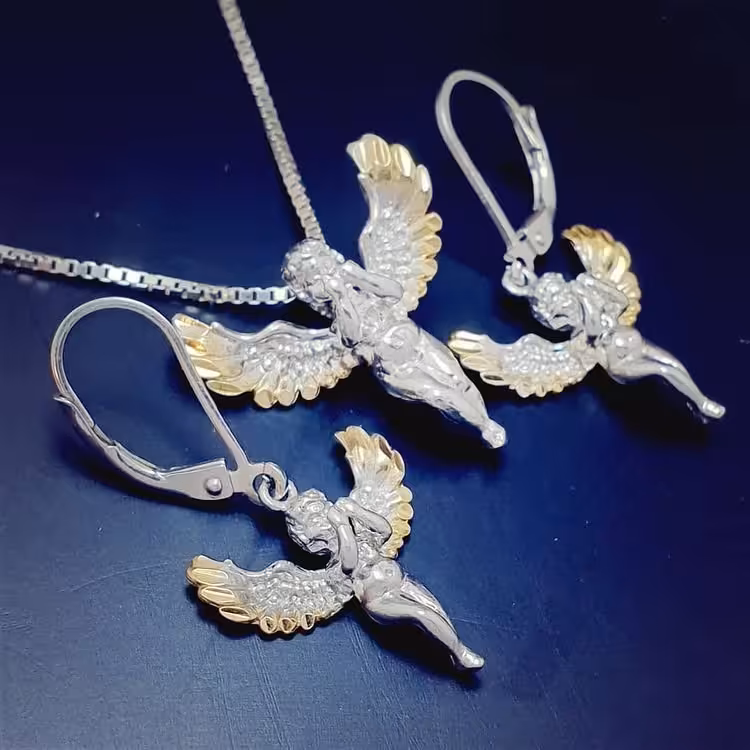 نیم ست نقره فرشته
ابکاری با طلایی
زنجیر