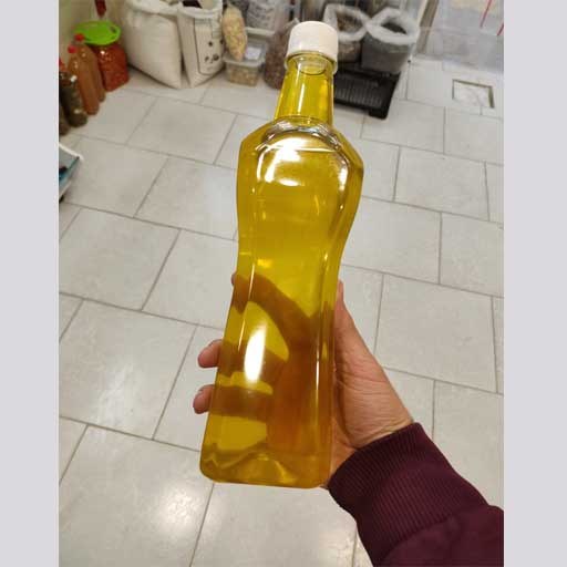 روغن کنجد محلی 100 درصد خالص شفاف با رنگ زرد روشن