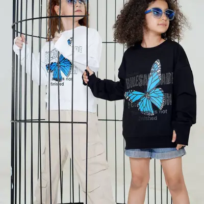 بلوز دخترانه دورس پنبه لاکرا  خاردار  سایز 40و45و50و55و60و65 مشکی و بنفش آستین فینگر دار نگین دار 