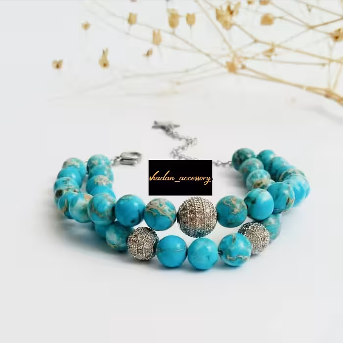 دستبند سنگ فیروزه آفریقایی با گوی سوارسکی نگین دار و آویز استیل ستاره