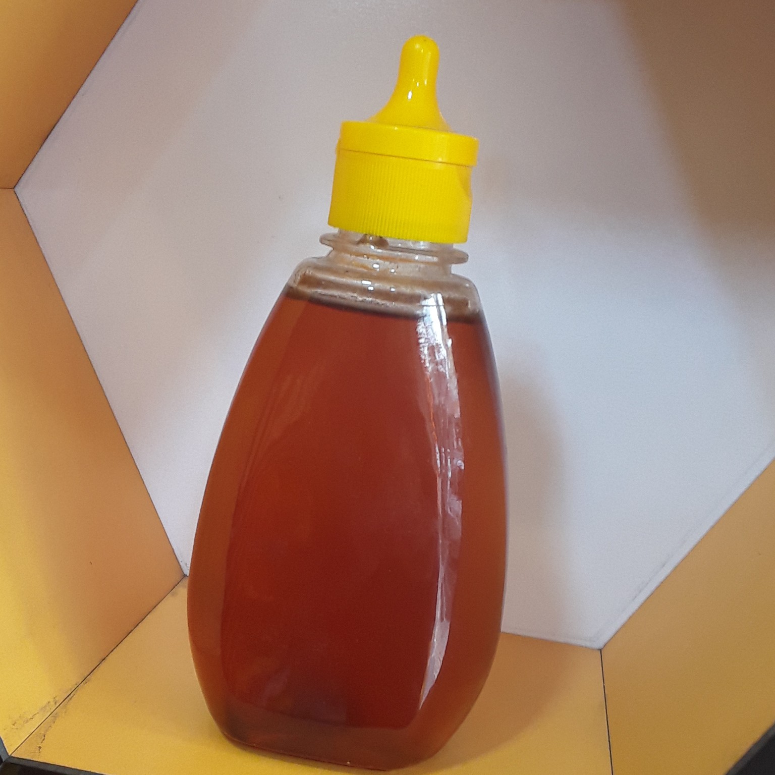 عسل طبیعی چهل گیاه بهاره گرماندیده آسان ریز کارمندی و دانش آموزی