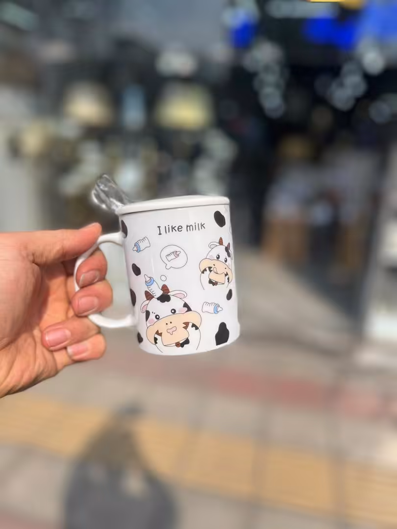 ماگ سرامیکی طرح گاوی قاشق دار 41