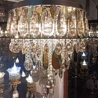 لوستر ملانی با بدنه استیل طلایی قطر 50 و ارتفاع 60