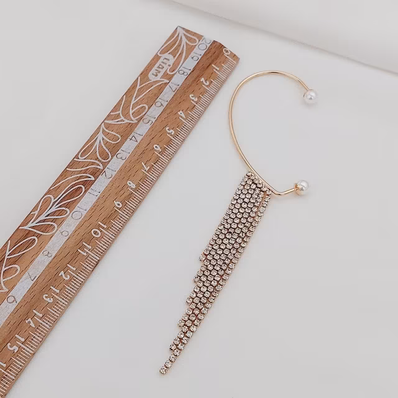 گوشواره بلوتوثی کد100100.برند محبوب ysx.تک گوش.با آبکاری طلا.ضد حساسیت.رنگ ثابت