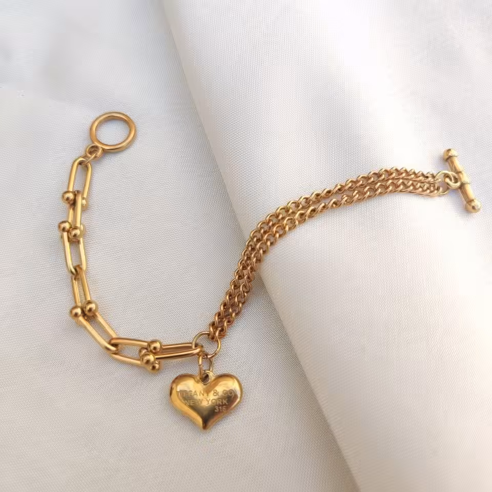 دستبند استیل تیفانی و کارتیر ریز