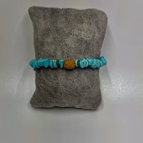 دستبند رنگ آبی فیروزه ای وزن 13 گرم اندازه 34 سانتیمتر 