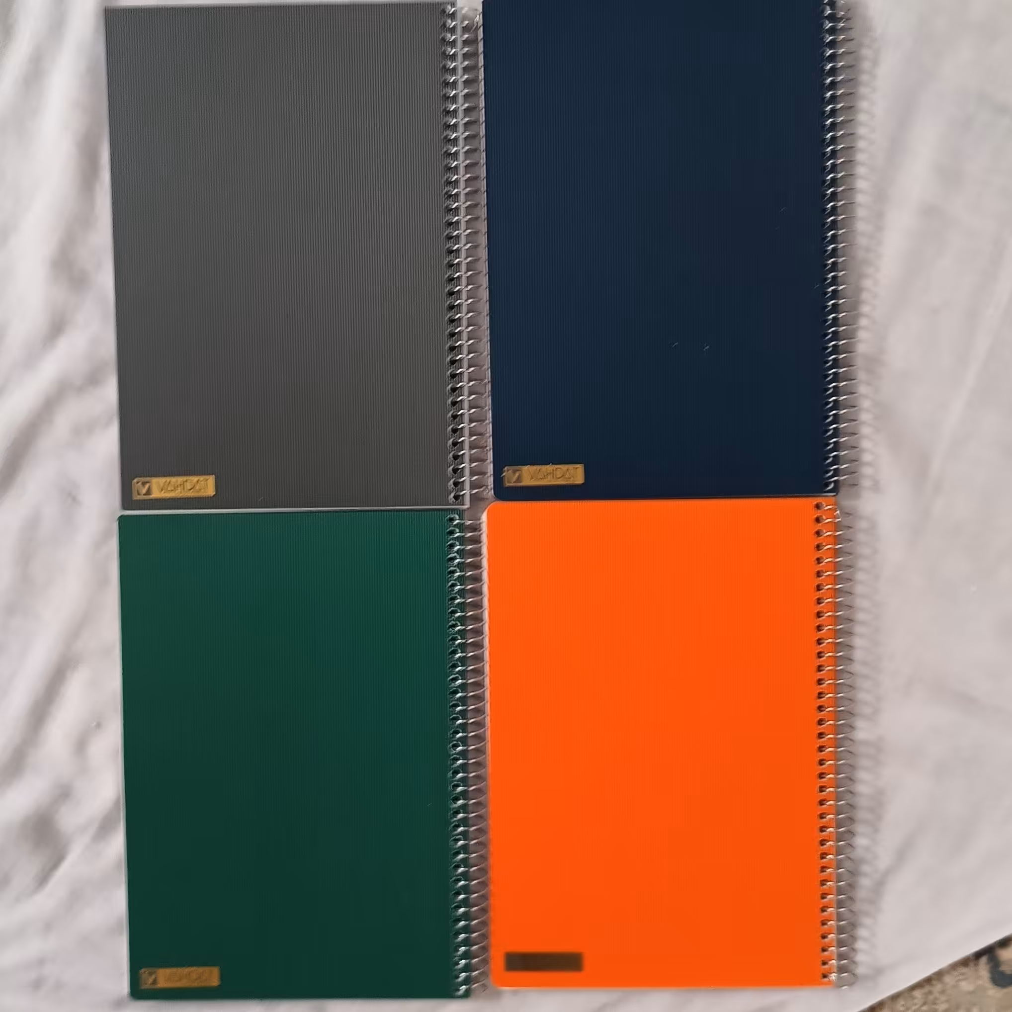 دفتر سیمی 100برگ وحدت جلد طلقی جنس عالی