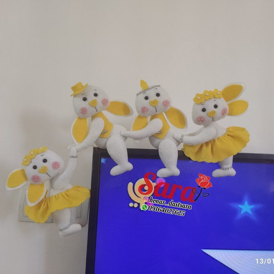 عروسک خرگوش نماد سال جدید تزئین تی وی ال ای دی با رنگ جذاااب زرد