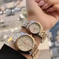 ساعت والار زنانه و مردانه بند استیل دو رنگ( قیمت تک)