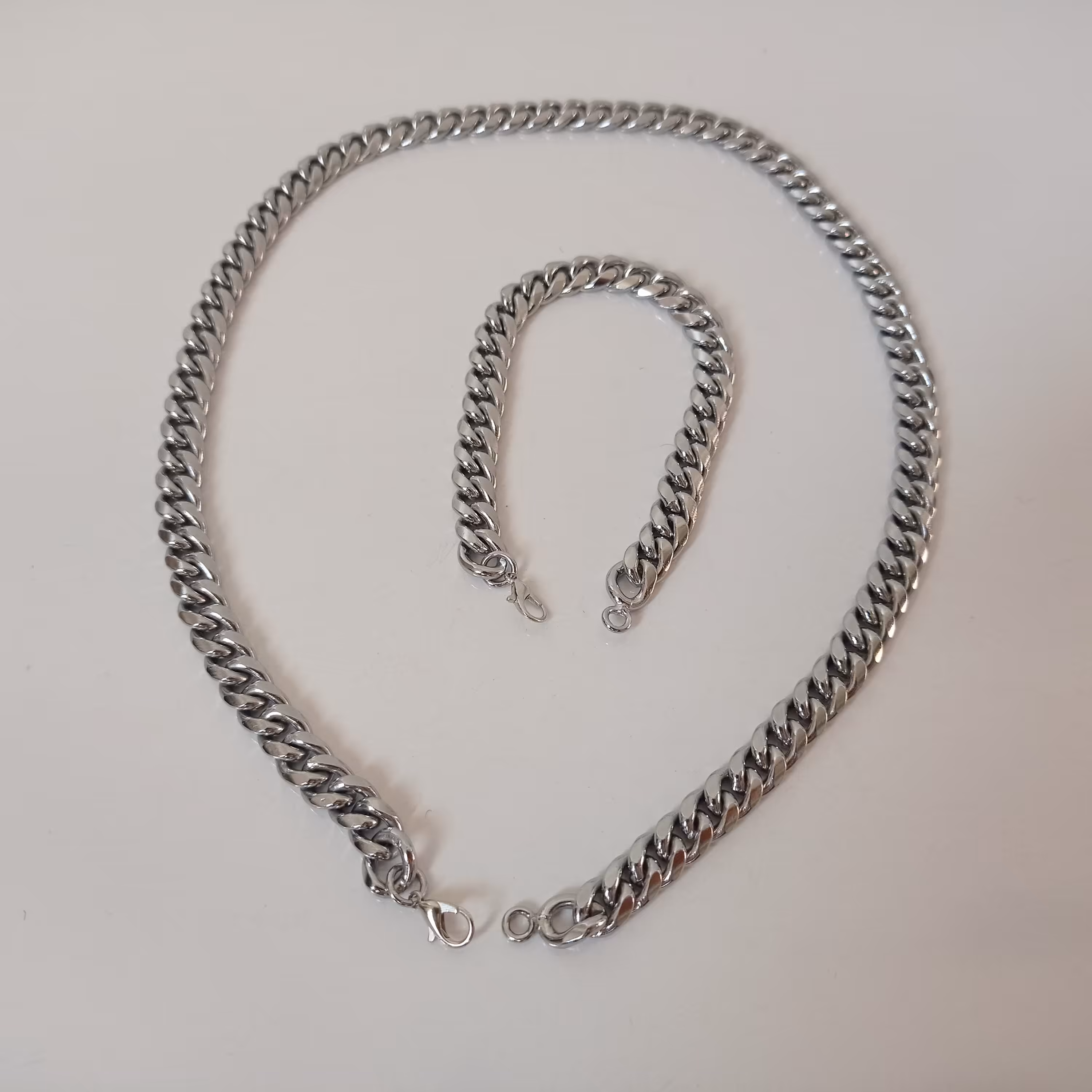 دستبند و گردنبند مسی آبکاری کروم طرح کارتیر زنجانیها