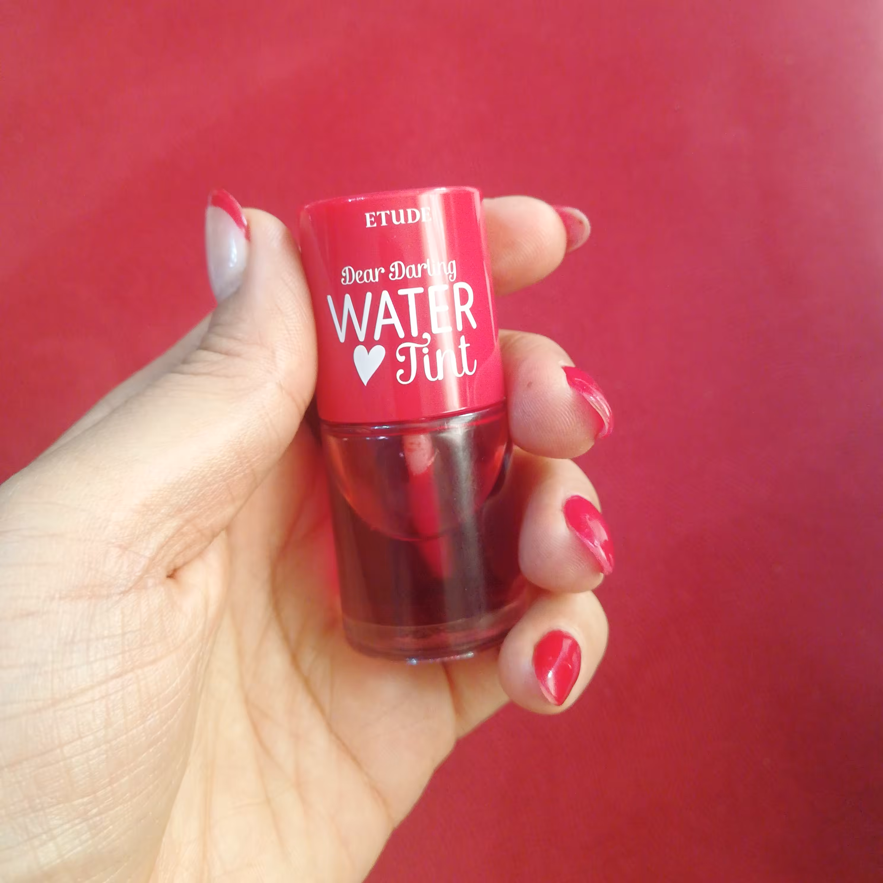 تینت لب اتود هاوس مدل water tint رنگ گیلاسی قرمز سبک با ماندگاری بالا