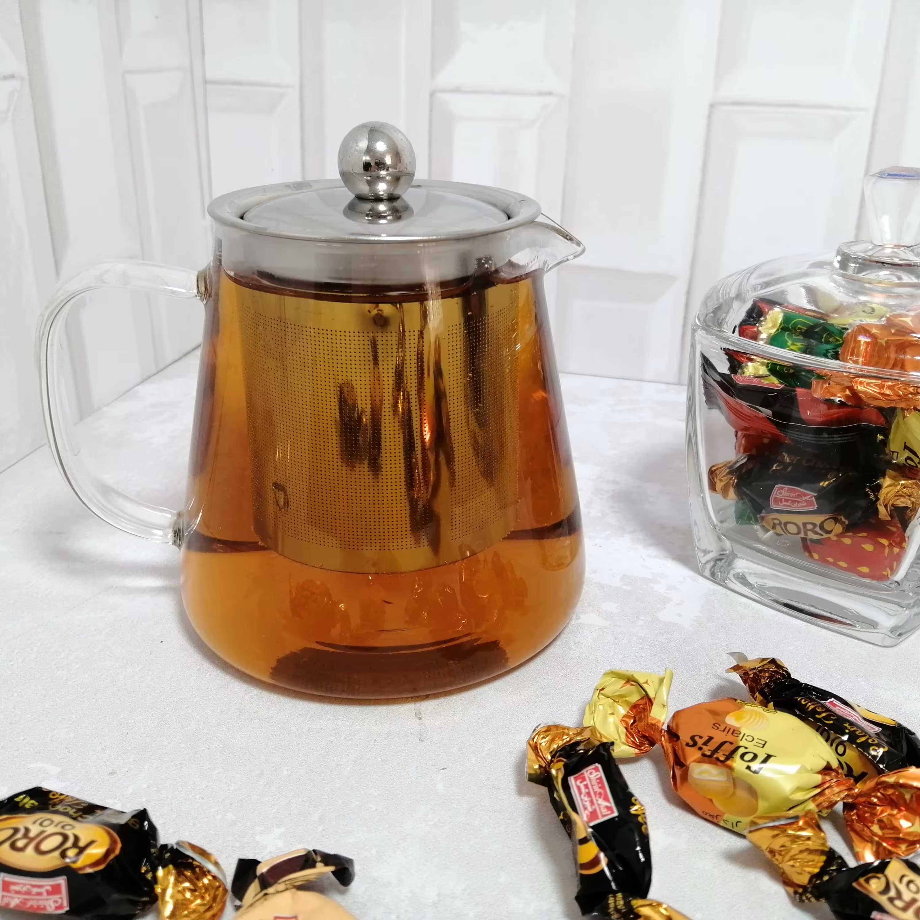 قوری 550میل پیرکس کد7441دارای جعبه کادوئی دارای صافی استیل برای چای ودمنوش