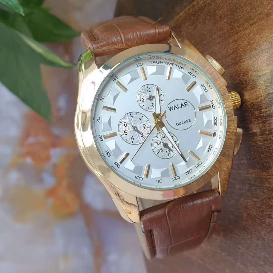 ساعت مردانه و پسرانه والار بند چرمی بدنه فلزی با گارانتی موتور و طرح سه موتوره تک موتور فعال 