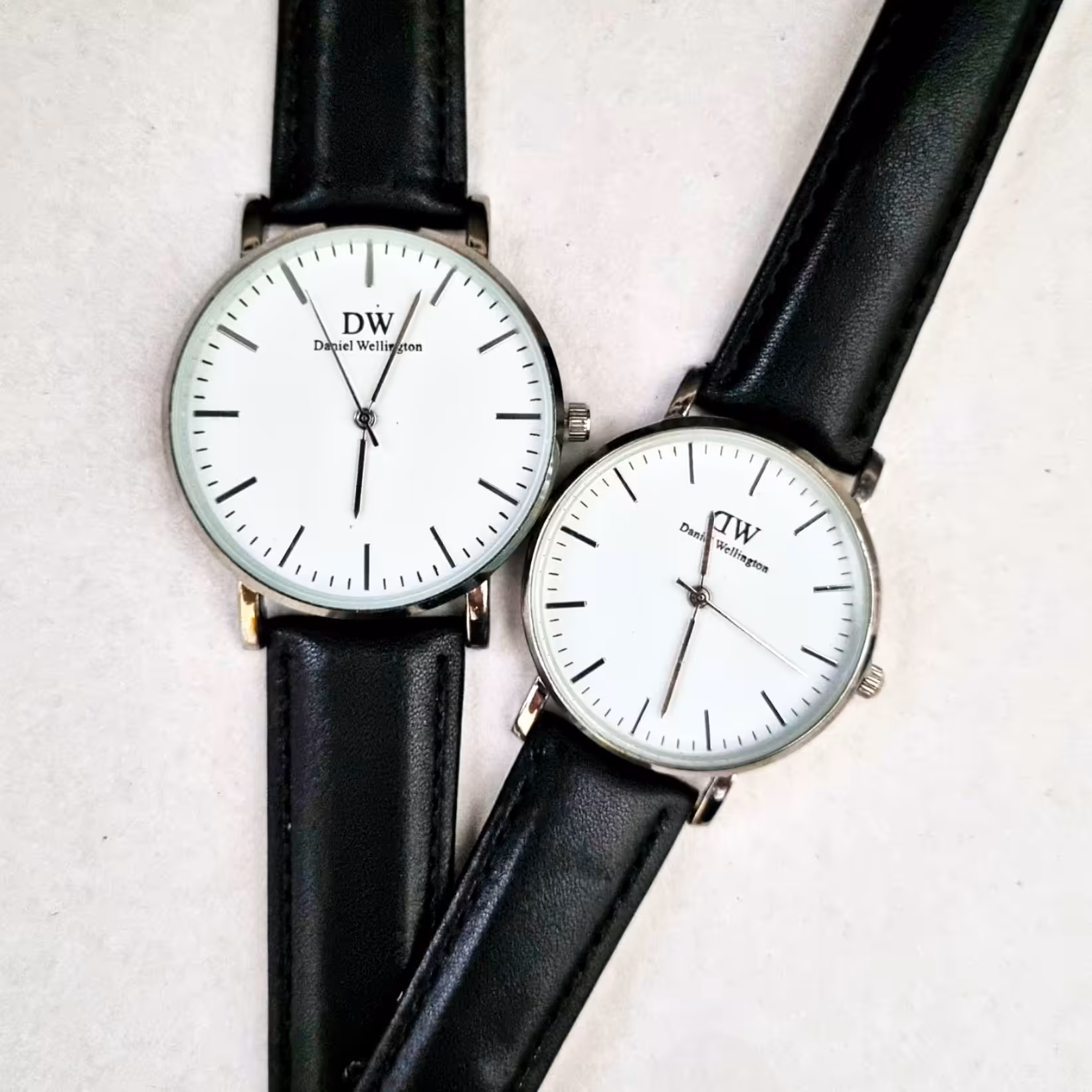 ساعت مچی ست DW - بند مشکی و قاب استیل - زنانه و مردانه - Daniel Wellington - 