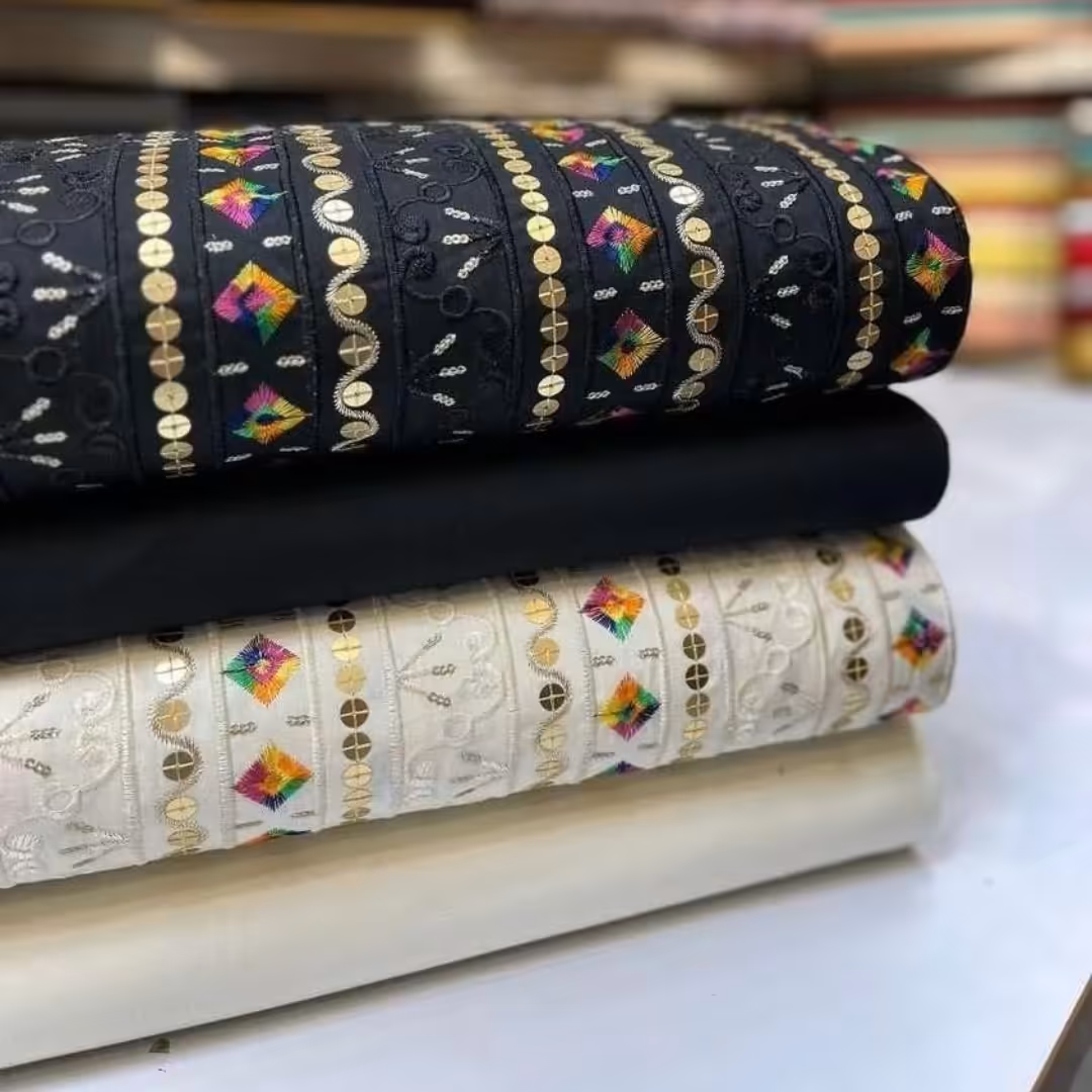 پارچه سوزن دوزی مولتی کالر  عرض 80و رنگ پر طرفدار جدید ومزونی شیک وخاص 