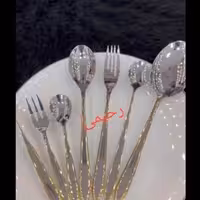 سرویس قاشق و چنگال 24 نفره 120 پارچه نیمه طلایی یونیک بیچمدان شیک زیبا