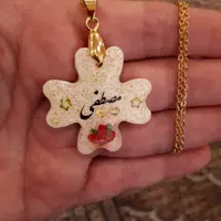 گردنبند رزینی  اسم مصطفی با زنجیر استیل رنگ ثابت 