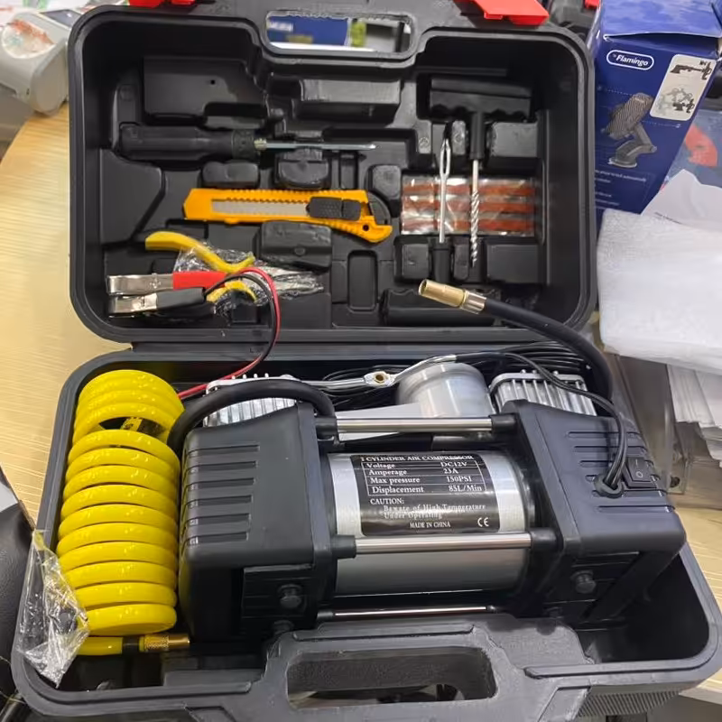 ست پنچگیری و پمپ باد خودرو در برق 12ولت و توان باد 23باد 