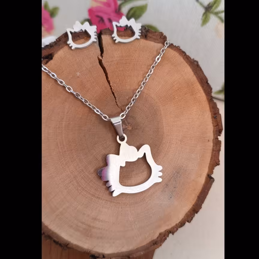 نیم ست نقره ای رنگ ثابت طرح کیتی (کد 127)