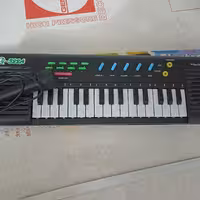 ارگ 32 کلیده برند MQ  باتری خور و میکروفن دار