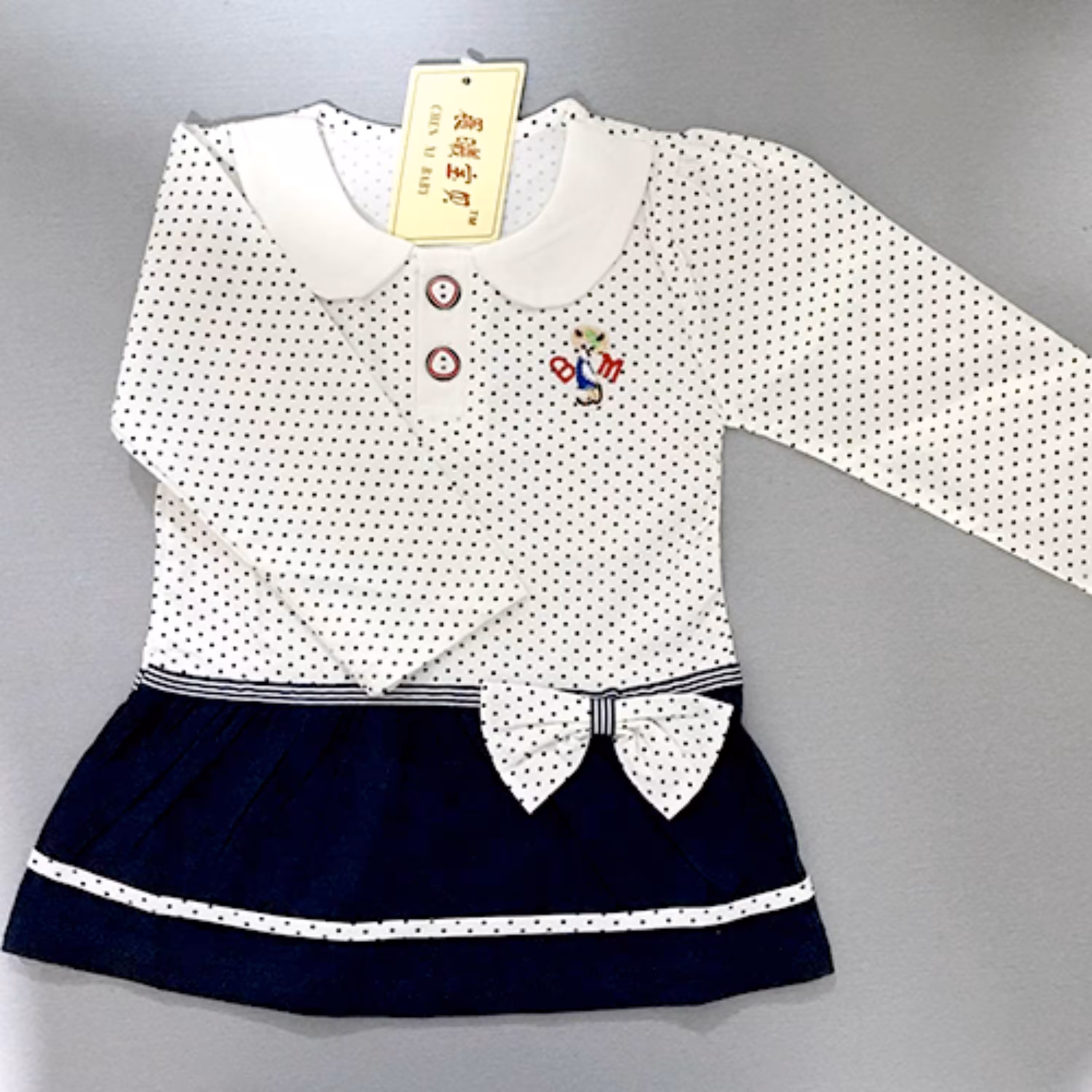 پیراهن بچه گانه دخترانه زیبا سفید سرمه ای خال خالی دامن دار مناسب برای یک تا یک و نیم سال