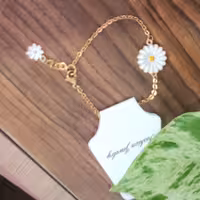 دستبند بابونه  طلایی رنگ ثابت 