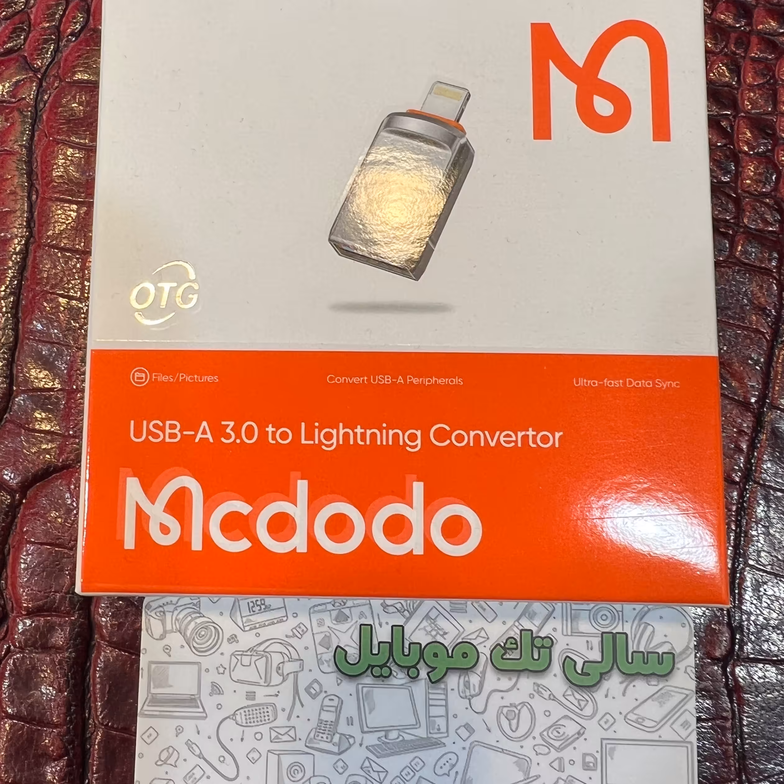 تبدیل OTG 
برای انتقال عکس و فیلم و اطلاعات از گوشی ایفون به usb