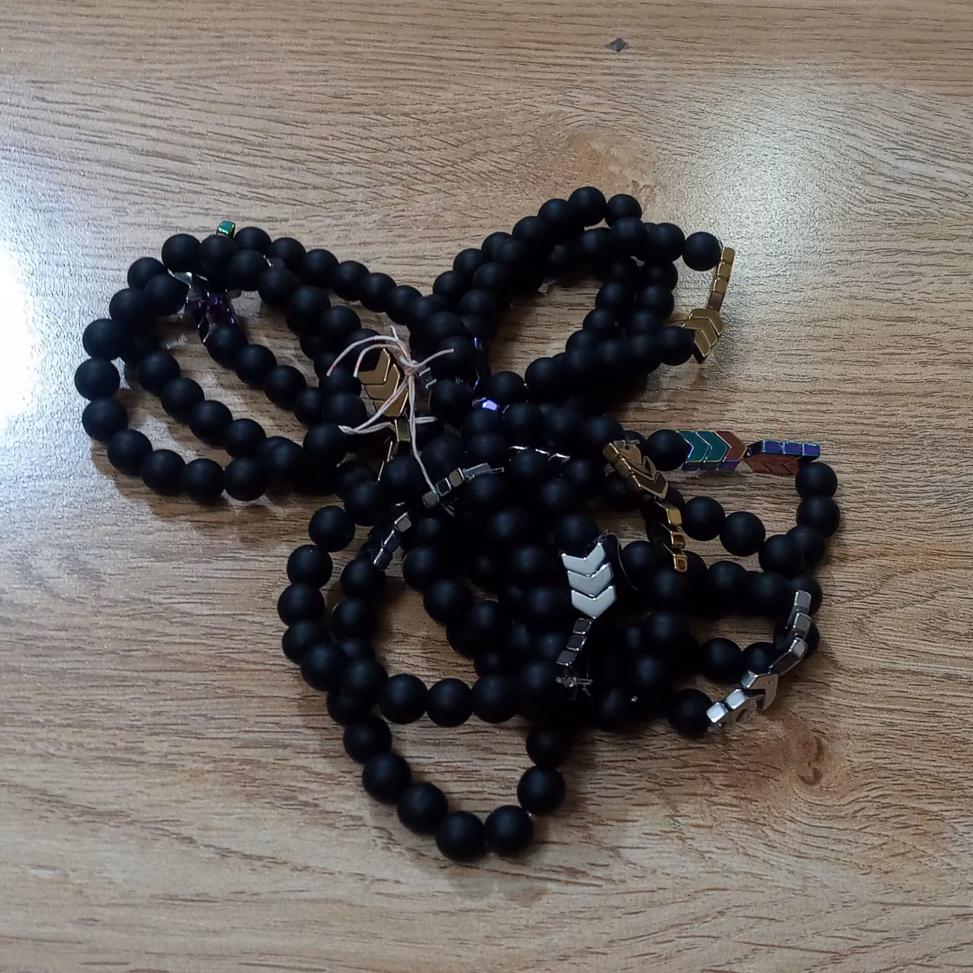 دستبند اونیکس مشکی پس کرایه  با پیک به  تهران   درب  منزل   پرداخت شود  