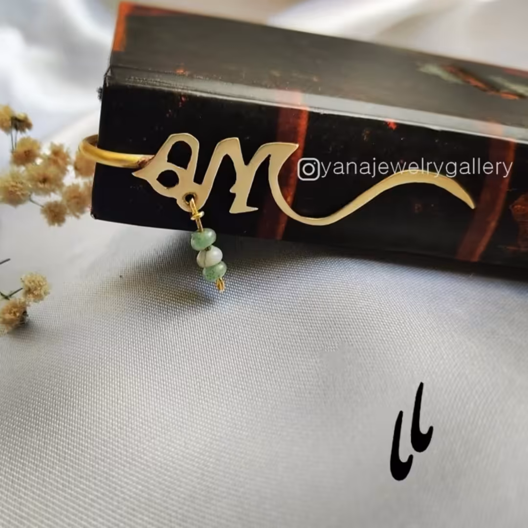 نشان کتاب برنجی با گوهر آونتورین طبیعی