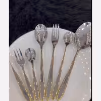 سرویس قاشق چنگال یونیک 24 نفره دهانه اروپایی نیمه طلایی تمام استیل 18/10 اصلی حکاکی جرمنی(فروش ویژه) 