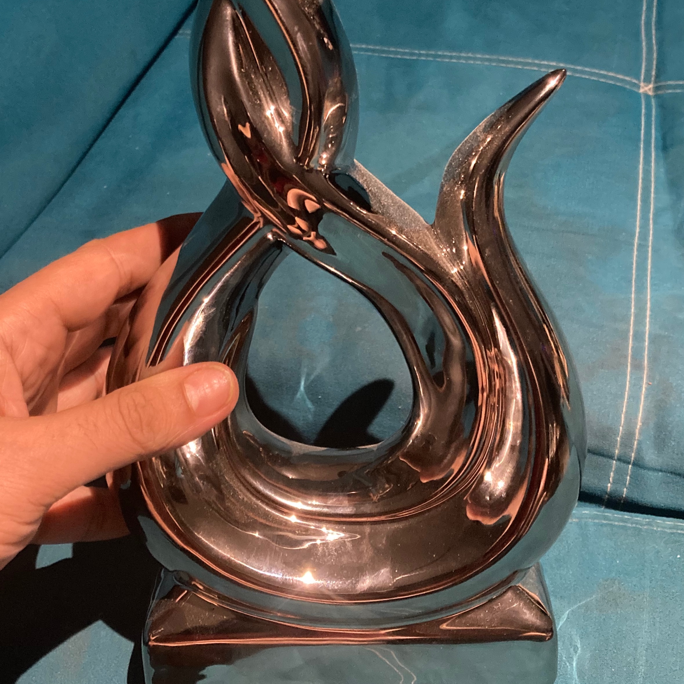 مجمسه سرامیک شکل شعله اتش رنگ نقره ایی