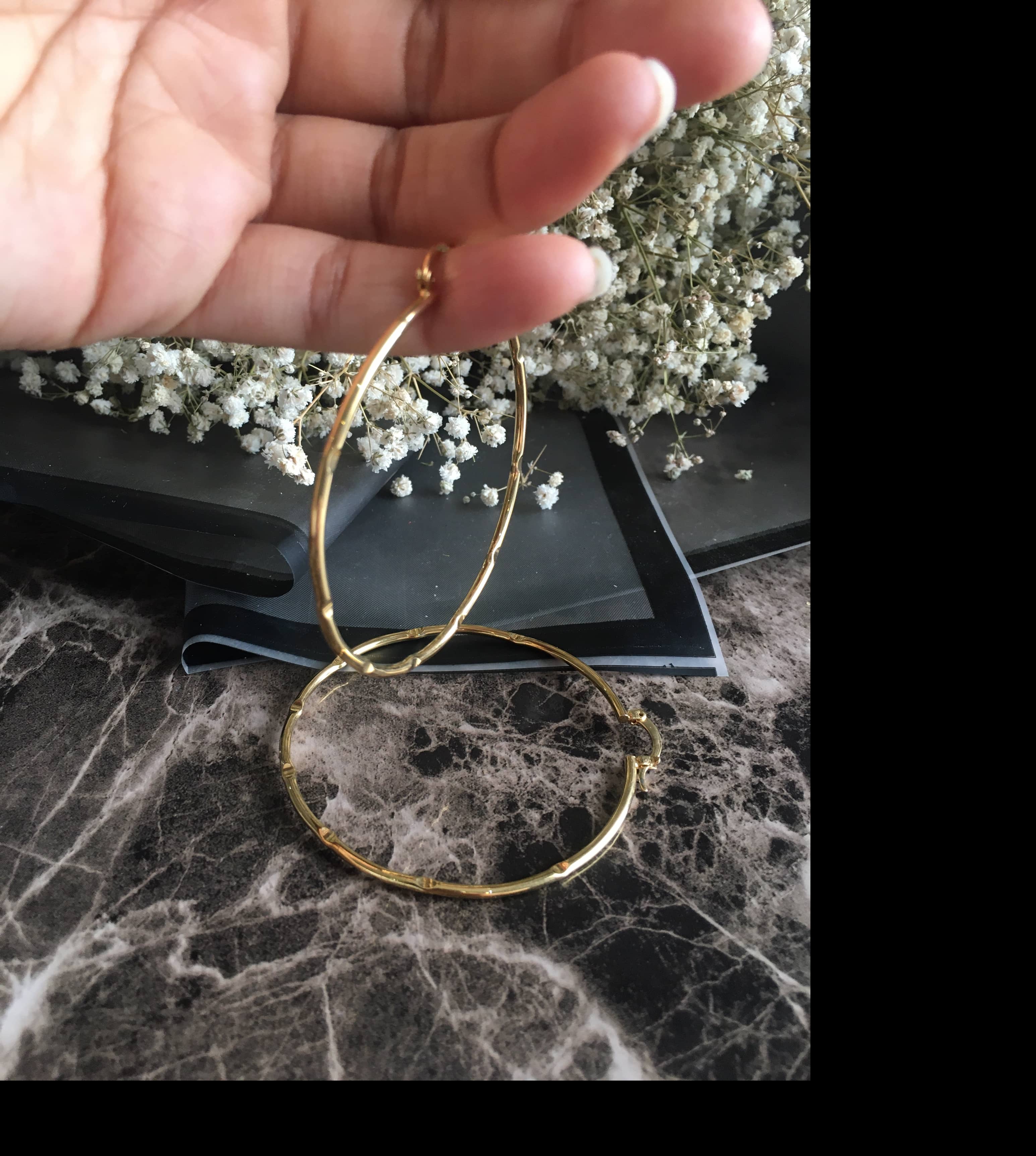 گوشواره حلقه ای طلایی رنگ ثابت