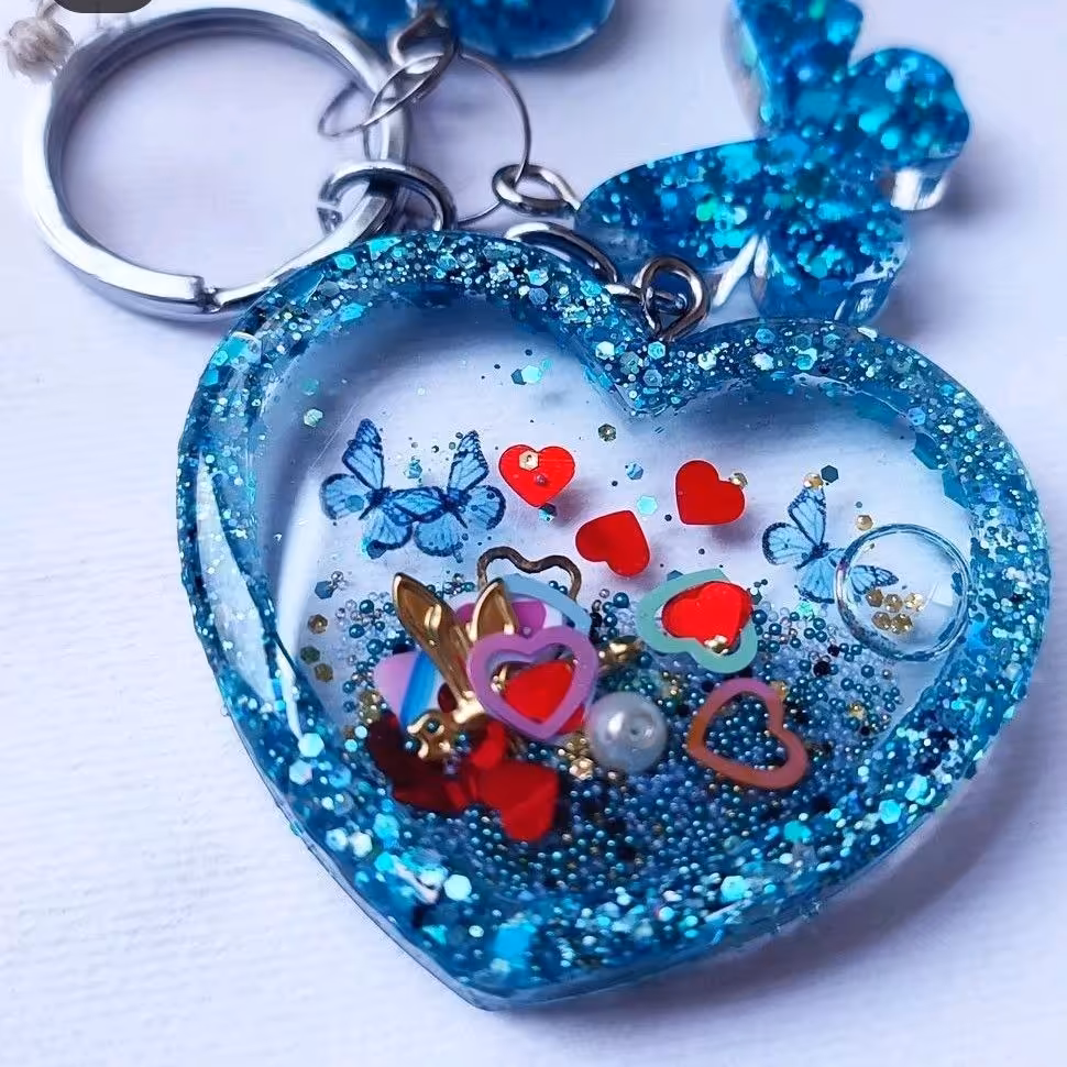 جاکلیدی رزینی آکواریومی مواد داخلش هم متحرکه 