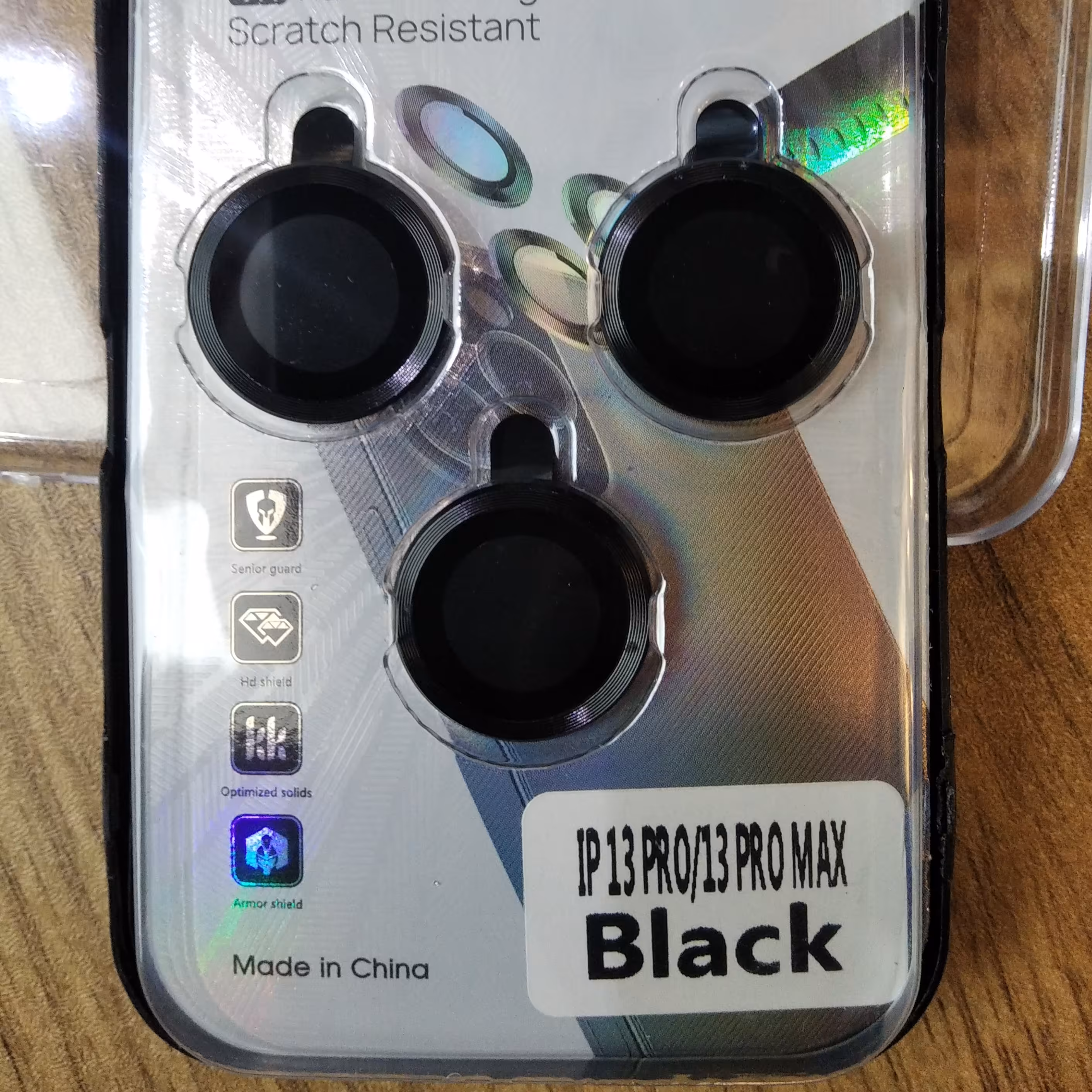 محافظ لنز رینگی آیفون 13 پرومکس.مشکی دارای دور فلزی و گلس شیشه ای داخل چسبندگی عالی