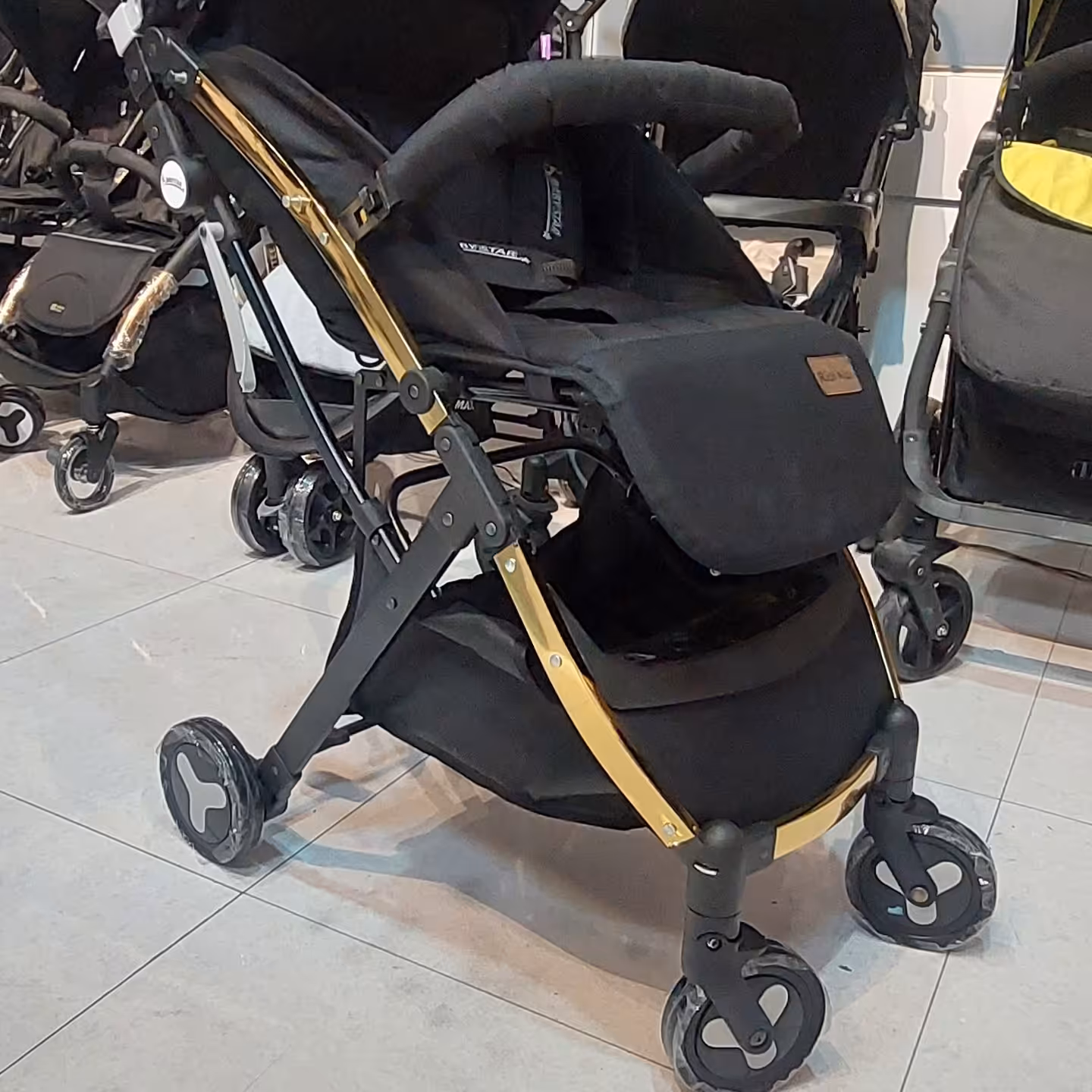 کالسکه مسافرتی ریچ کیدز مدل گلد پرو