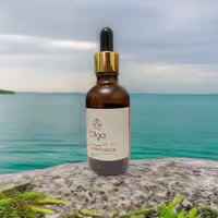 ضدآفتاب بدون رنگ spf80 الگا گیاهی بی رنگ 50cc حاوی جینسینگ قرمز و شیرین بیان و سنتلا ضد آفتاب جذبی مایع