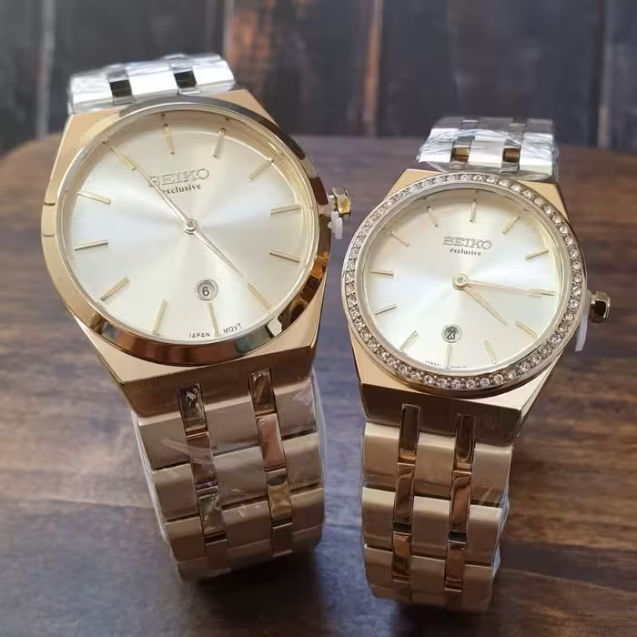 ساعت مچی ست زنانه و مردانه سیکو بند استیل بدنه استیل  قفل تاشو seiko 