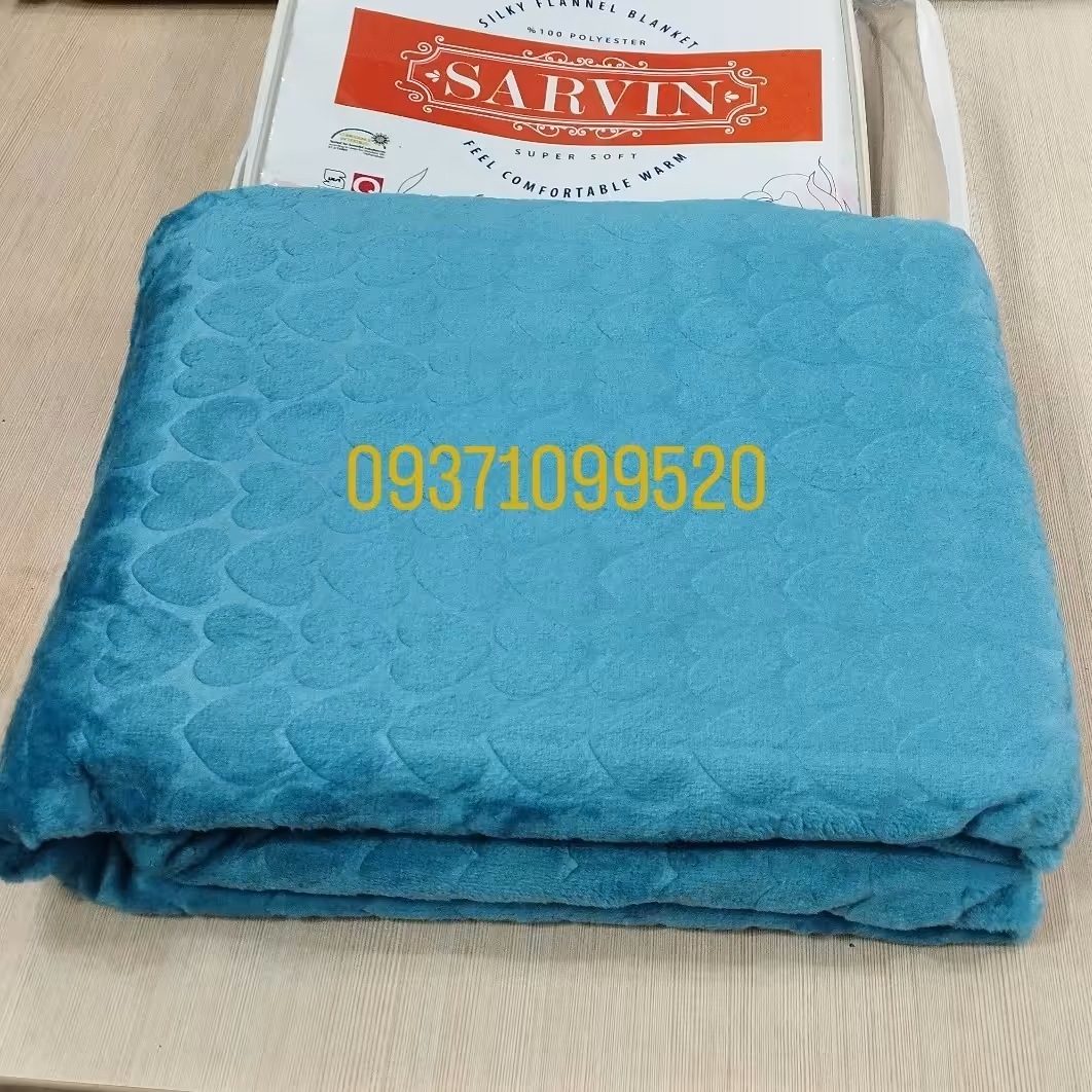 پتو نرمینه یکنفره مدل سروین مسافرتی ساکدار براق و لطیف رنگ آبی