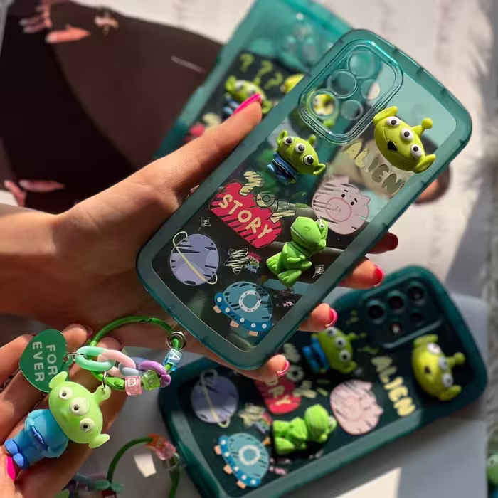 کاور برجسته گوشی Samsung Galaxy A53 طرح زیبای Alien Toy همراه با آویز کد 51
