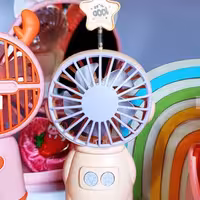 دستگاه پنکه رومیزی شارژی کوچک مینی کیوت فانتزی خنک کننده صورت و خشک کننده لاک ناخن دارای جای گوشی