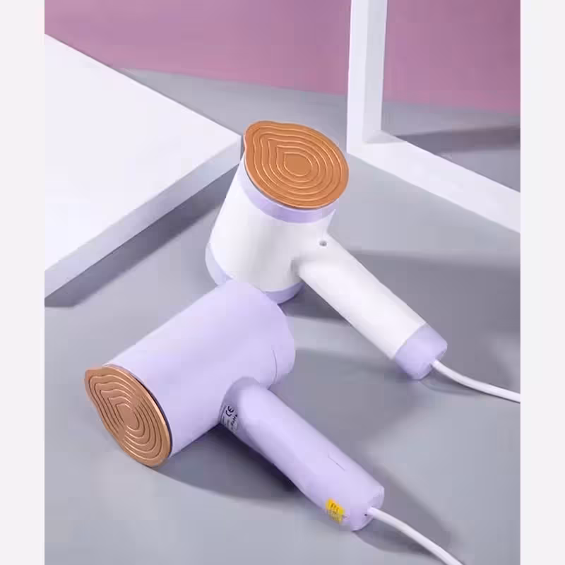 اتو مسافرتی همراه پرزگیر تیغه 6 برگی