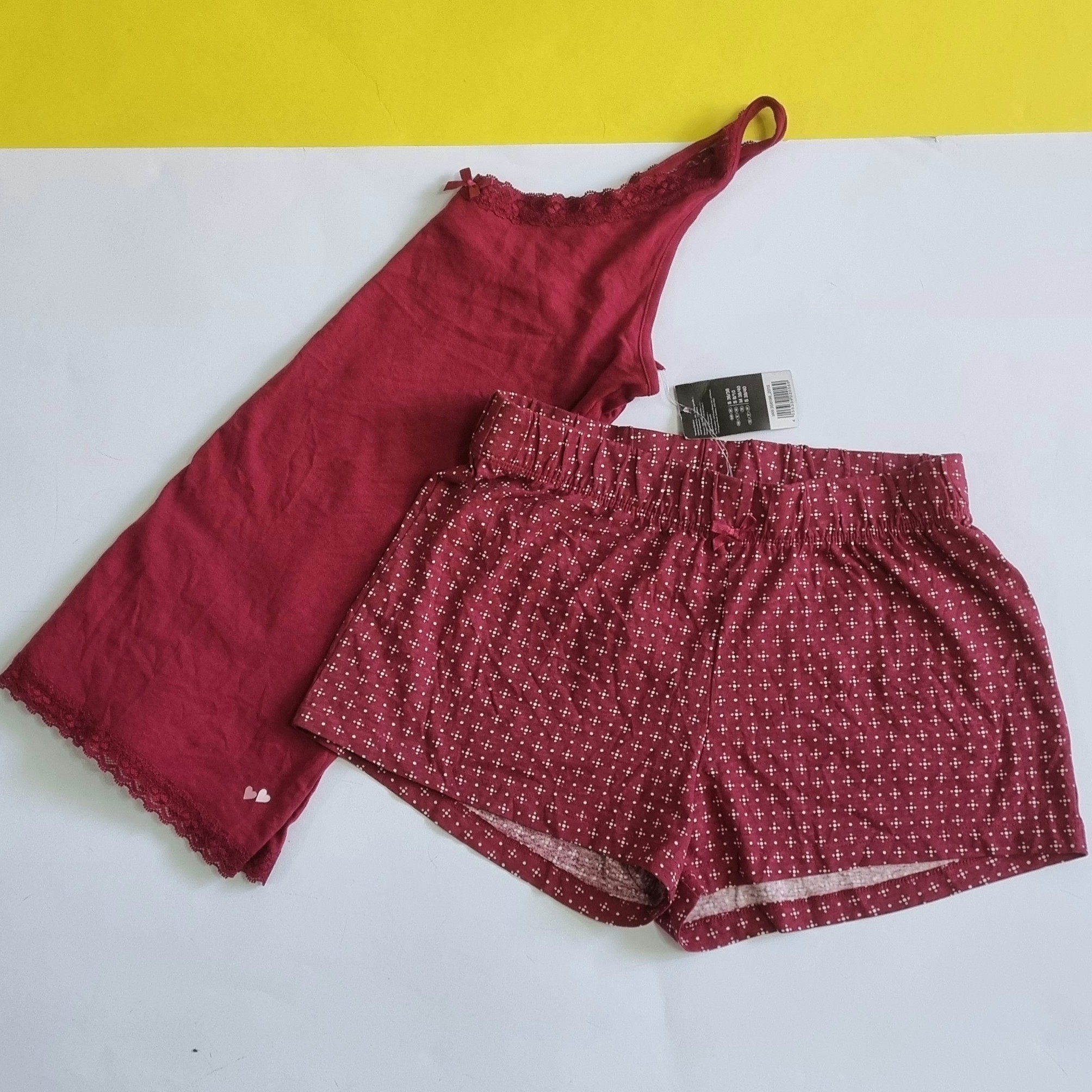 ست تاپ و شلوار ک اسمارا ESMARA سایز  اسمال 36 و 38 برای 40 هم اندازه میشه جنس عالی زرشکی ساده و طرح دار