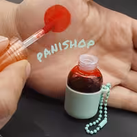 تینت لب مجیک MAGIC مدل قمقمه رنگ قرمز ملایم بازنجیر آویز کاملا ضدآب  بافت بسیار سبک و 24 ساعته مات  تاریخ مصرف 2027