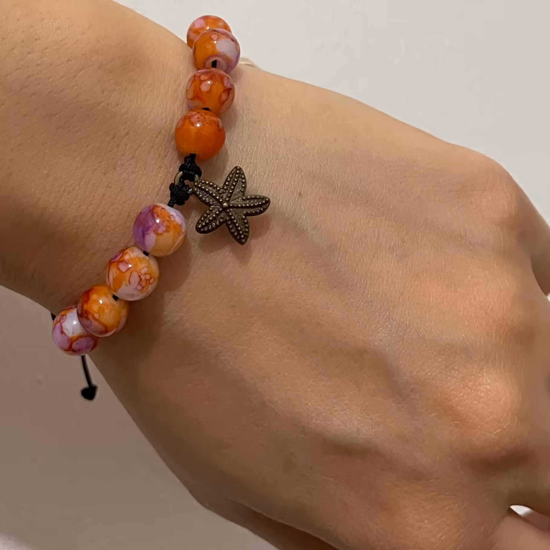 دستبند مهره چشم ببر ستاره دریایی بافت کشویی