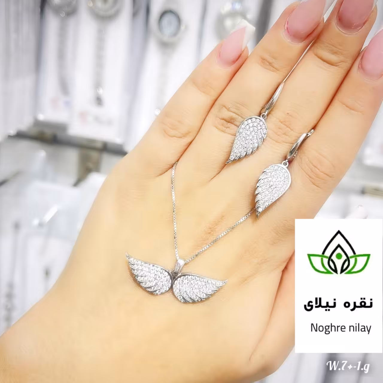 نیم ست نقره بال فرشته  با عیار 925و آبکاری طلا  رنگ ثابت تضمینی  مناسب برای شیک پسندادارای فاکتور معتبر و ارسال رایگان 