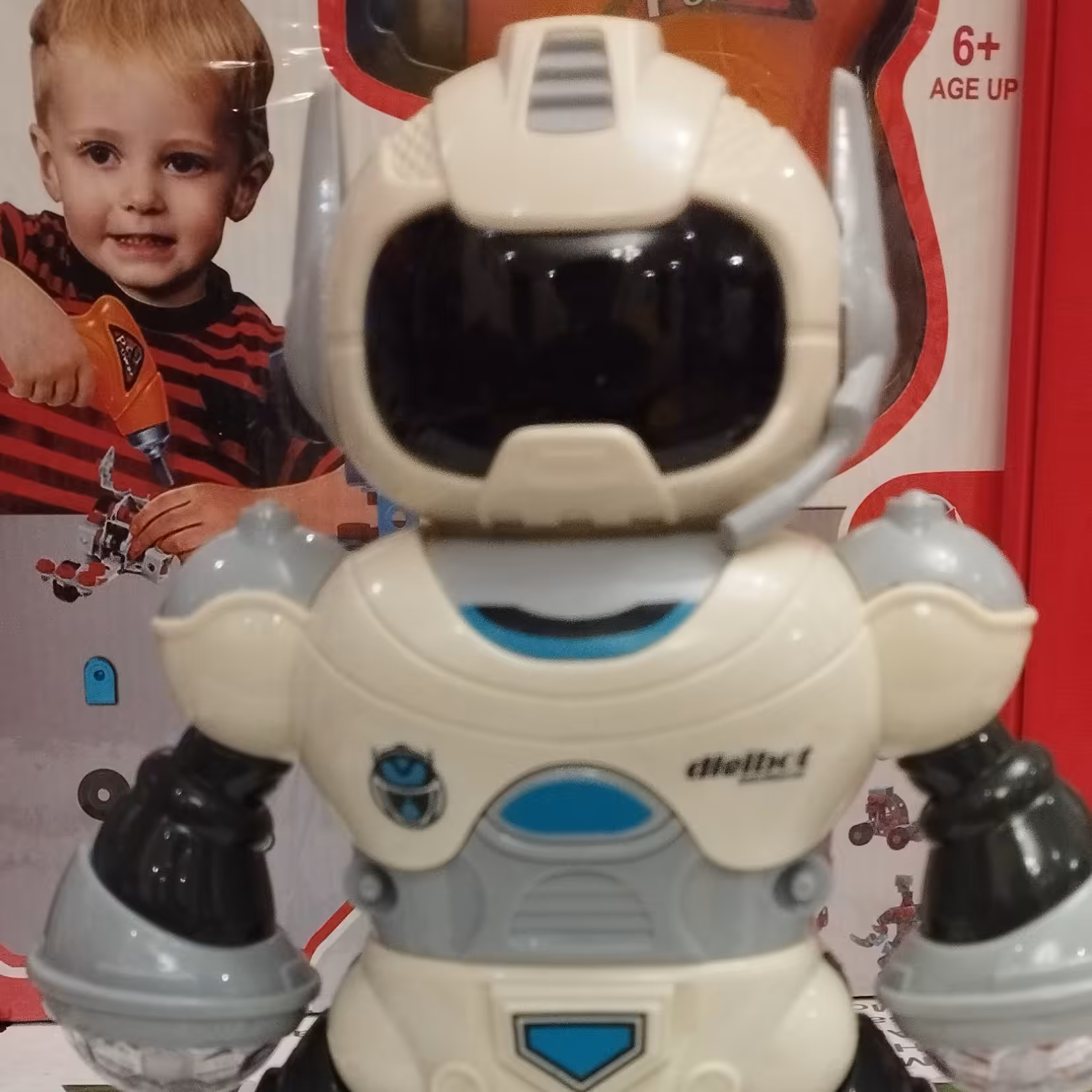 اسباب بازی ربات موزیکال چرخشی چراغدار با پایه  خارجی سایز کوچک