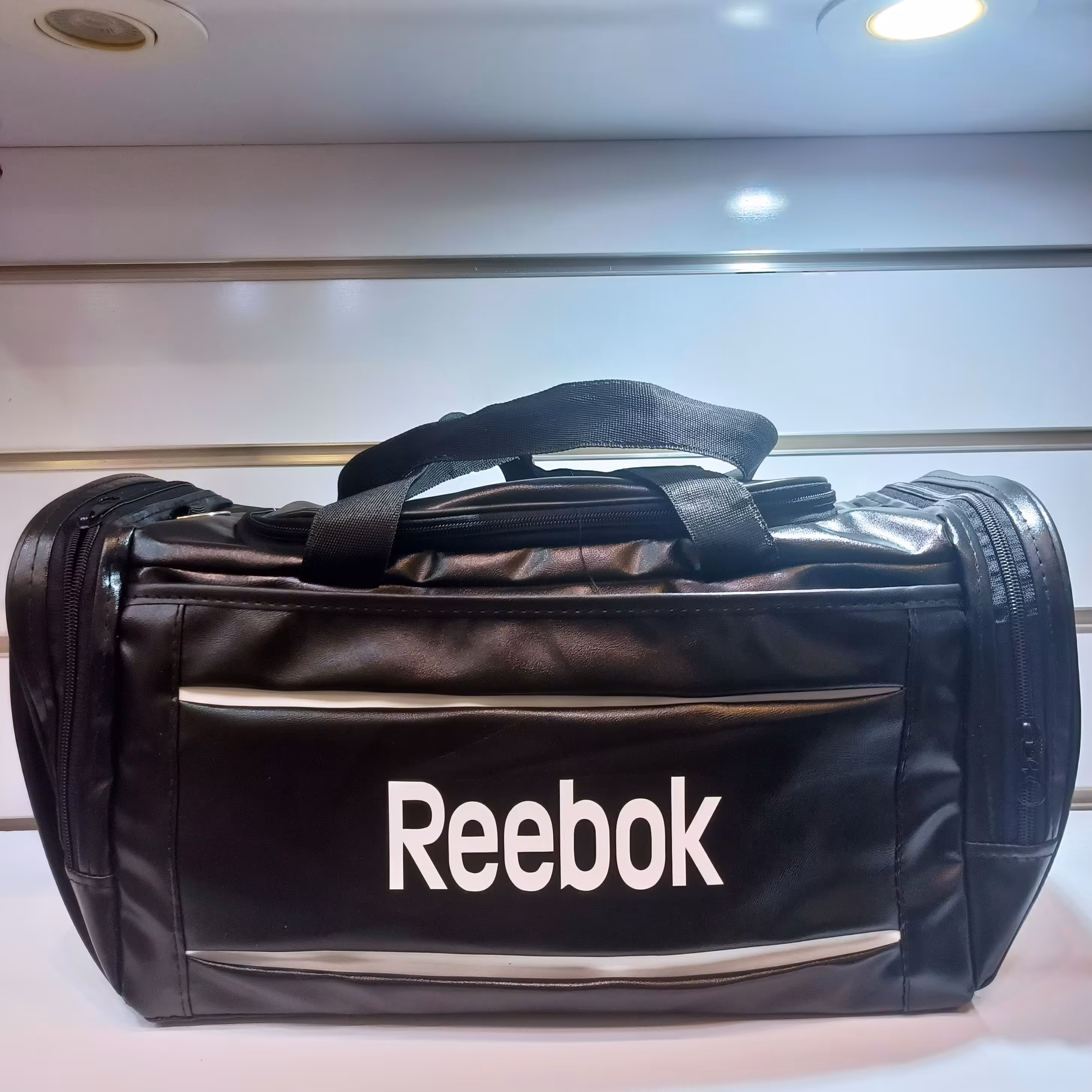 سام ورزشی بزرگ دخترانه پسرانه در رنگ های مشکی آبی زرد قرمز 